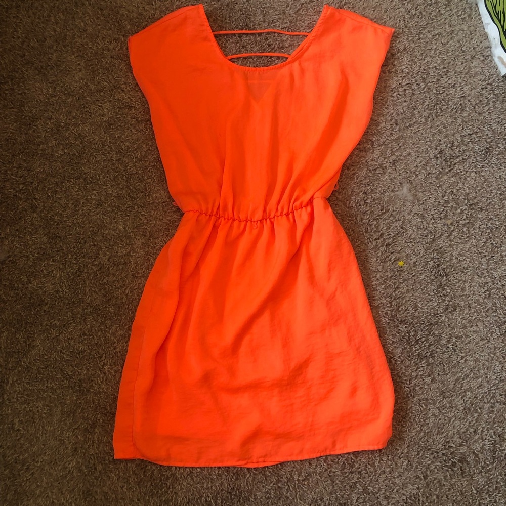 Bright Orange Charlotte Russe mini dress, cute back detailing size small.